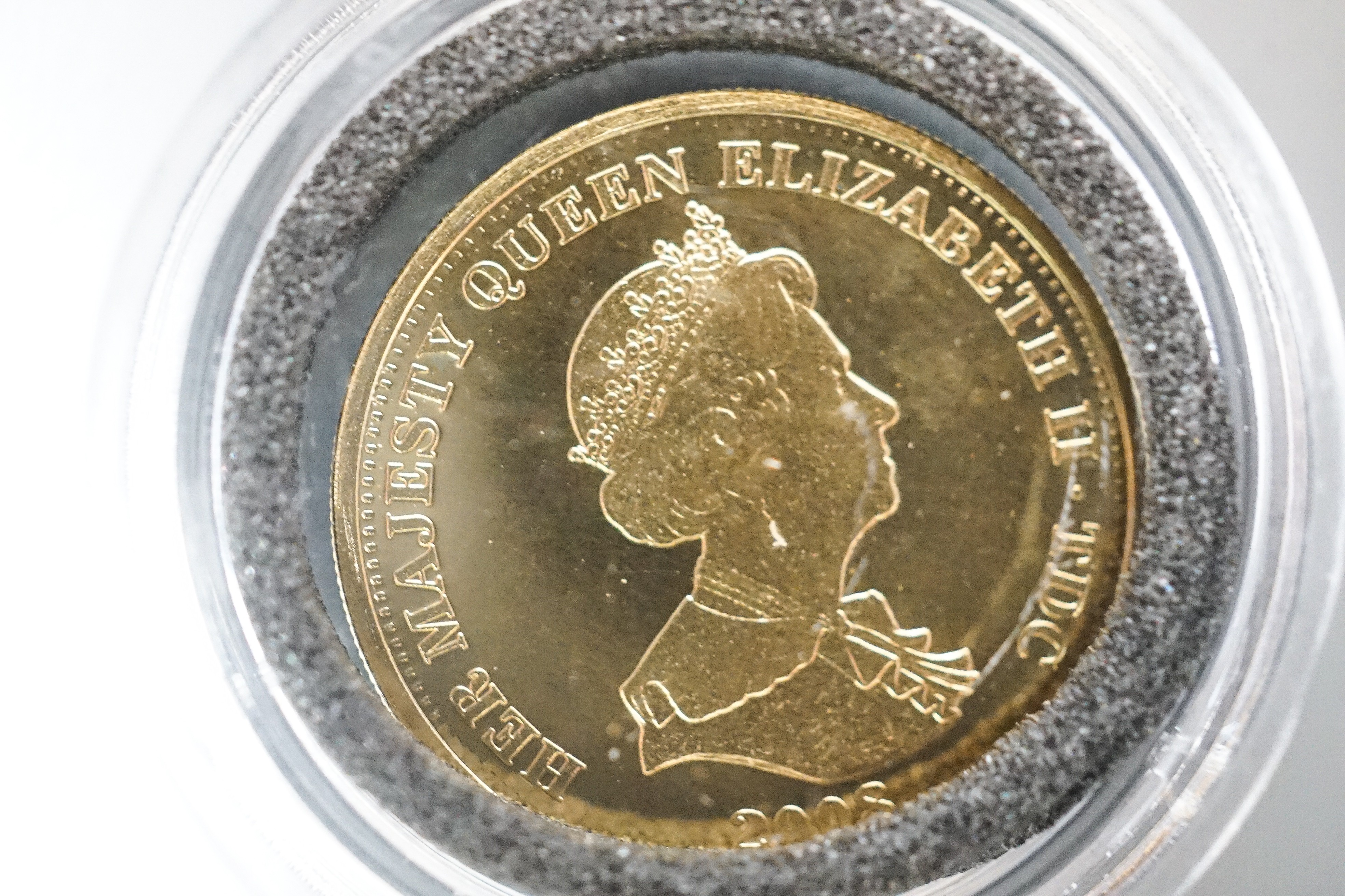 A London mint Tristan da Cunha gold half guinea, Brilliant Unc, and a similar gold piedfort one crown, cased with certificates (2)
